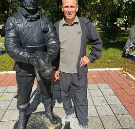 Николай